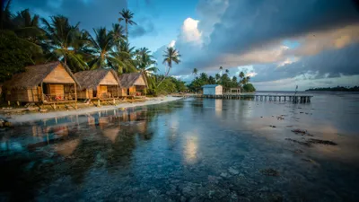 Depicting Serene Holiday Traditional Thatched Nature Wallpaper 4K 3840x2160 Hd, Desktop, Wallpaper, Depicting, A, Serene, Holiday, Scene, Traditional, Thatched-roof, Huts, Tropical, Gray, Brown, Ultrawide, 4k