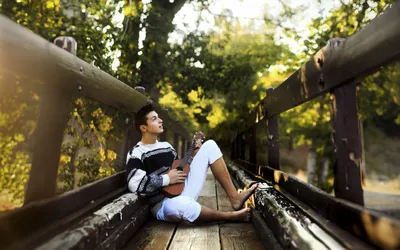 Man Sitting Wooden Bridge Amidst World Wallpaper 4K 2558x1598 Full HD, Ultrawide