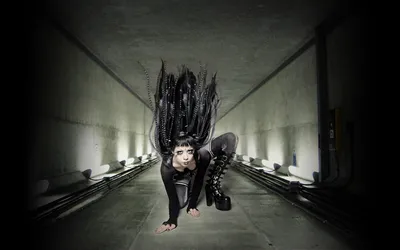 Vibrant Dark Wallpaper Black/Dark Wallpaper 4K 1680x1050 Dark, Gothic, Figure, With, Long, Spiked, Hair, Crouches, Dimly, Lit, Concrete, Tunnel, Gray, Ultrawide
