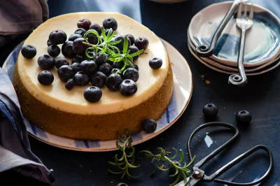 Blueberry Cheesecake Topped Fresh Black/Dark Wallpaper 4K 2400x1596 A, Blueberry, Cheesecake, Topped, With, Fresh, Berries, And, Rosemary, Sprigs, Accompanied, Plates, White, Ultrawide, Full HD