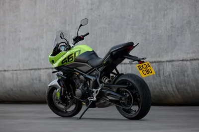 Crisp Triumph Wallpaper Animals Wallpaper 4K 4096x2732 A, Triumph, Tiger, Sport, 660, Motorcycle, In, Vibrant, Yellow, Black, Against, Concrete, Gray, Landscape, 4k