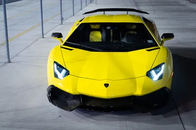 Front Yellow Sports Cars Wallpaper 4K 6000x4000 Front, View, Of, A, Yellow, Lamborghini, Sports, Car, Headlights, Parked, Chain-link, Fence, Purple, Landscape, 4k