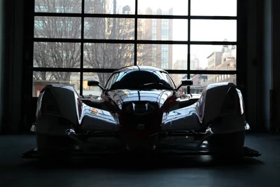 Sleek Car Silhouette Cars Wallpaper 4K 5472x3648 A, Sleek, Car, Silhouette, Is, Showcased, Against, Large, Garage, Window, Creating, Dynamic, White, Gray, Landscape, 4k