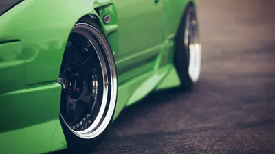 Vibrant Green Car Sleek Black Cars Wallpaper 4K 1920x1080 A, Vibrant, Green, Car, With, Sleek, Black, Rims, Sporty, Design, Showcased, High-definition, Brown, Ultrawide, Full HD