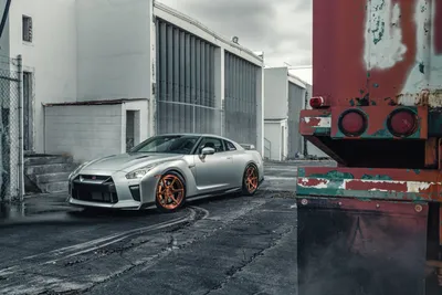 Silver Supercar Orange Rims Urban Cars Wallpaper 4K 7794x5200 Silver, Nissan, Gt-r, Supercar, With, Orange, Rims, Parked, Urban, Industrial, Setting, Captured, Gray, Landscape, 4k