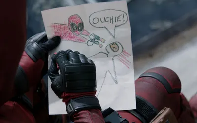 Movie Deadpool Character Abstract Wallpaper 4K 1680x1050 A, Scene, From, The, Movie, Deadpool, Featuring, Character, Holding, Colorful, Drawing, Word, Gray, White, Ultrawide