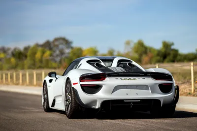 Vibrant Sleek Wallpaper Cars Wallpaper 4K 4000x2667 A, Sleek, White, Porsche, 918, Spyder, Supercar, Stands, Sunlit, Road, Showcasing, Stunning, Pink, Gray, Landscape, 4k
