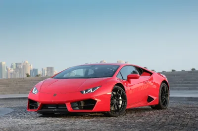 Red Supercar Cobblestone Surface Cars Wallpaper 4K 4096x2730 Red, Lamborghini, Huracan, Supercar, Parked, On, A, Cobblestone, Surface, City, Skyline, Captured, White, Ultrawide, 4k