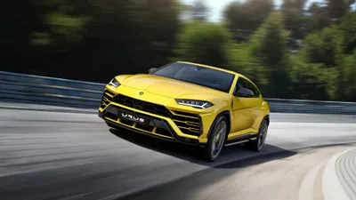 Calm Sleek Wallpaper Cars Wallpaper 4K 3840x2160 A, Sleek, Yellow, Lamborghini, Urus, Suv, Driving, On, Curvy, Road, Set, Against, Gray, Ultrawide, 4k