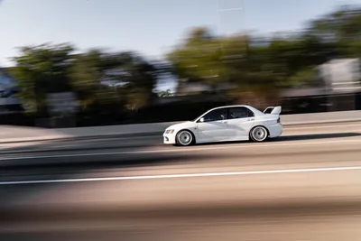 White Mitsubishi Lancer Evolution Abstract Wallpaper 4K 9504x6336 White, Mitsubishi, Lancer, Evolution, Ix, Speeding, Along, A, Sunlit, Highway;, Motion-blurred, Ultra, Landscape, 4k