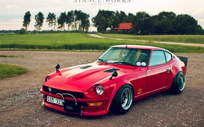 Moody Red Wallpaper Cars Wallpaper 4K 1920x1200 A, Striking, Red, Jdm, Vehicle, Parked, On, Gravel, Road, Surrounded, Lush, Greenery, White, Ultrawide, Full HD