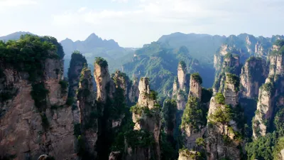 Scenic Towering Cliffs Amidst Nature Wallpaper 4K 3840x2160 Scenic, View, Of, Towering, Cliffs, Amidst, Lush, Greenery, Capturing, Majesty, Nature, Showcases, White, Ultrawide, 4k