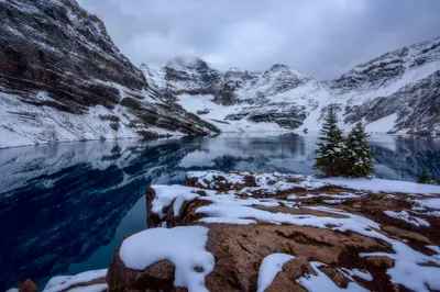 Snow Covered Mountains Surround Nature Wallpaper 4K 2000x1335 Snow-covered, Mountains, Surround, A, Serene, Lake, Under, Cloudy, Winter, Sky, Creating, Striking, Pink, Gray, Landscape, Full HD