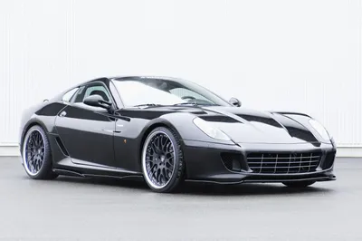 Bold Sleek Wallpaper Cars Wallpaper 4K 5692x3780 A, Sleek, Black, Sports, Car, With, Custom, Wheels, Set, Against, Minimalist, Serves, White, Ultrawide, 4k