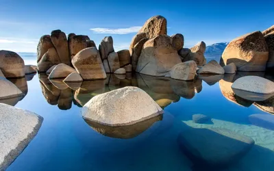 Sleek Serene Wallpaper Nature Wallpaper 4K 2560x1600 A, Serene, Lake, Reflects, Large, Smooth, Rocks, Under, Clear, Blue, Sky, Creating, Red, Gray, Ultrawide, QHD