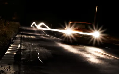 Serene Dimly Wallpaper Cars Wallpaper 4K 2560x1600 A, Dimly, Lit, Road, At, Night, Featuring, Car, Bright, Headlights, Creating, Dynamic, White, Ultrawide, QHD
