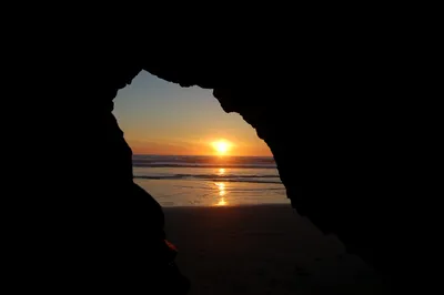 Vivid Sunset Wallpaper Nature Wallpaper 4K 3008x2000 A, Stunning, Sunset, Viewed, Through, Cave, Highlighting, Tranquil, Ocean, Waves, Sandy, Beach, Brown, Gray, Ultrawide, QHD