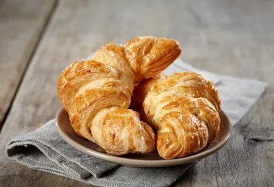 Close Three Golden Croissants Abstract Wallpaper 4K 4450x3033 A, Close-up, Shot, Of, Three, Golden, Croissants, On, Plate, Set, Rustic, Wooden, Gray, Landscape, 4k