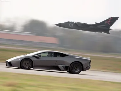 Sleek Grey Reventon Races Cars Wallpaper 4K 1600x1200 A, Sleek, Grey, Lamborghini, Reventon, Races, Along, The, Ground, Jet, Aircraft, Soars, White, Landscape