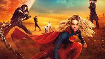 Supergirl Crouches Her Animals Wallpaper 4K 3840x2160 Supergirl, (2026), Crouches, With, Her, Red, Cape, Billowing, Against, Golden-orange, Sunset, Brown, Gray, Ultrawide, 4k