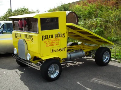 Vibrant Yellow Truck Cars Wallpaper 4K 3648x2736 A, Vibrant, Yellow, Truck, With, Unique, Design, Featuring, Sloped, Cargo, Bed, Vintage, White, Landscape, QHD