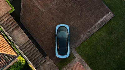 Sleek Aerial Wallpaper Cars Wallpaper 4K 3840x2160 Aerial, View, Of, A, Light-blue, Ferrari, Luce, Vehicle, Parked, Modern, Driveway, Ultra, Brown, Gray, Ultrawide, 4k