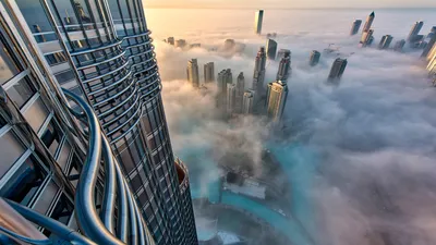 Sleek Foggy Wallpaper World Wallpaper 4K 1920x1080 A, Foggy, Aerial, View, Of, Dubai’s, Skyscrapers, With, Dubai, Prominent, Modern, Buildings, White, Gray, Ultrawide, Full HD