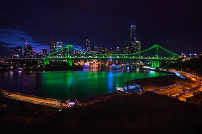 Radiant Night Wallpaper Nature Wallpaper 4K 2048x1363 Night, View, Of, The, Illuminated, Story, Bridge, And, Brisbane, Skyscrapers, Reflecting, Vibrant, Brown, Ultrawide, Full HD