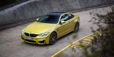 Calm Vibrant Wallpaper Cars Wallpaper 4K 3000x1500 A, Striking, Bmw, M4, In, Vibrant, Yellow, Parked, Curved, Road, Showcasing, Sleek, Gray, Ultrawide, QHD
