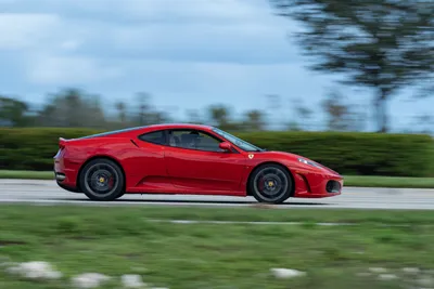 Red Speeding Past Landscaped Cars Wallpaper 4K 6000x4000 Red, Ferrari, Speeding, Past, A, Landscaped, Roadside, With, Motion, Blur, Ultra, Desktop, Gray, Pink, Landscape, 4k