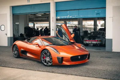 Radiant Orange Wallpaper Cars Wallpaper 4K 2500x1669 An, Orange, Jaguar, C-x75, Luxury, Car, With, Its, Doors, Open, Parked, Front, Gray, Landscape, Full HD