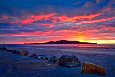 Vibrant Vibrant Wallpaper Nature Wallpaper 4K 2048x1365 A, Vibrant, Sunset, Over, Beach, With, Colorful, Clouds, Reflecting, Water, Scattered, Rocks, Brown, Red, Ultrawide, Full HD