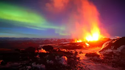 Volcano Erupting Surrounded Snow Illuminated Nature Wallpaper 4K 1920x1080 A, Striking, Hd, Image, Of, Volcano, Erupting, Surrounded, Snow, Illuminated, Vibrant, Auroras, White, Brown, Ultrawide, Full HD