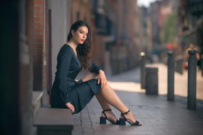 Moody Brunette Wallpaper Black/Dark Wallpaper 4K 2048x1365 Brunette, Woman, In, A, Black, Dress, And, Lipstick, Poses, Seated, City, Sidewalk, Gray, Ultrawide, Full HD