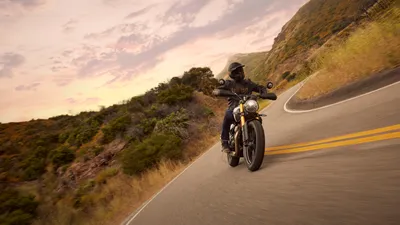 Triumph Scrambler Motorcycle Navigates Cars Wallpaper 4K 8188x4606 A, Triumph, Scrambler, 400, X, Motorcycle, Navigates, Winding, Road, Surrounded, Lush, Hills, Gray, Brown, White, Ultrawide, 4k
