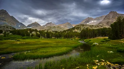 Serene Landscape Lush Green Meadows Nature Wallpaper 4K 3840x2160 A, Serene, Landscape, Featuring, Lush, Green, Meadows, And, Flowing, Stream, Framed, Majestic, Gray, Brown, Ultrawide, 4k