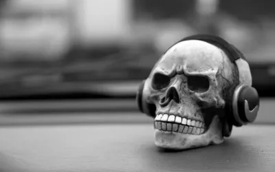 Black White Skull Wearing Black/Dark Wallpaper 4K 1920x1200 A, Black, And, White, Image, Of, Skull, Wearing, Headphones, Set, Against, Dark, Gray, Ultrawide, Full HD