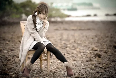 Radiant Woman Wallpaper Abstract Wallpaper 4K 1920x1280 A, Woman, Sits, On, Chair, In, An, Outdoor, Setting, Wearing, Coat, Scarf, White, Gray, Landscape, Full HD