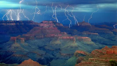 Serene Grand Wallpaper Nature Wallpaper 4K 1920x1080 A, Stunning, Hd, Wallpaper, Of, The, Grand, Canyon, Showcasing, Dramatic, Lightning, Illuminating, Brown, Gray, Ultrawide, Full HD