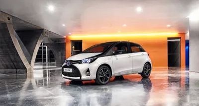 Radiant White Wallpaper Cars Wallpaper 4K 4096x2193 White, Toyota, Yaris, Compact, Car, Displayed, In, A, Sleek, Modern, Indoor, Setting, Ultrawide, 4k