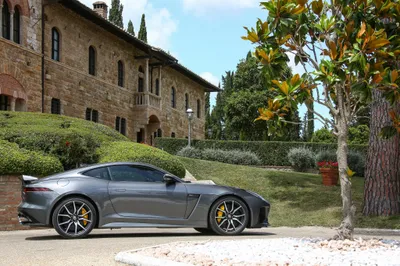 Radiant Silver Wallpaper World Wallpaper 4K 4096x2731 Silver, Jaguar, F-type, Parked, Beside, A, Garden, With, Manicured, Bushes, Stone, Building, White, Landscape, 4K