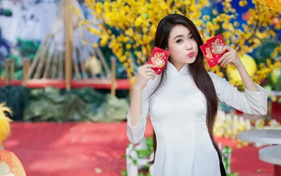 Asian Woman Dressed White Holds Nature Wallpaper 4K 1920x1200 An, Asian, Woman, Dressed, In, White, Holds, Two, Red, Envelopes, Standing, Front, Ultrawide, Full HD