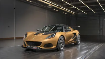 Gold Lotus Elise Supercar Cars Wallpaper 4K 4096x2304 Gold, Lotus, Elise, Supercar, Parked, In, A, Glossy, Industrial, Garage, Ultra, Desktop, Orange, Ultrawide, 4k
