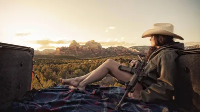 Moody Woman Wallpaper Nature Wallpaper 4K 3532x1987 A, Woman, In, Cowboy, Hat, Relaxes, Outdoors, Seated, Blanket, Gun, Hand, Set, White, Ultrawide, QHD