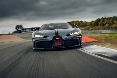 Bold Front Wallpaper Cars Wallpaper 4K 7000x4666 Front, View, Of, A, Black, Bugatti, Chiron, Pur, Sport, Supercar, Speeding, Racetrack, Gray, Ultrawide, 4k