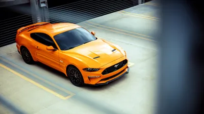 Orange Mustang Muscle Cars Wallpaper 4K 4096x2304 Orange, Ford, Mustang, Gt, Muscle, Car, Parked, In, Industrial, Setting, Showcased, Ultra, White, Ultrawide, 4k