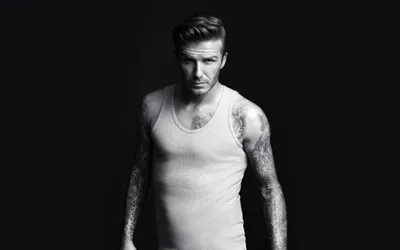 Sleek David Wallpaper Black/Dark Wallpaper 4K 2560x1600 David, Beckham, Poses, Confidently, In, A, Black, And, White, Showcasing, His, Tattoos, Ultrawide, QHD