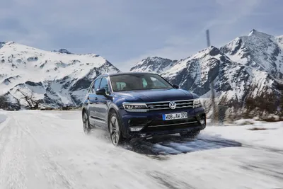 Vivid Volkswagen Wallpaper Nature Wallpaper 4K 4069x2713 Volkswagen, Tiguan, Suv, Driving, On, A, Snowy, Mountain, Road, Snow-covered, Peaks, Captured, White, Gray, Landscape, 4k