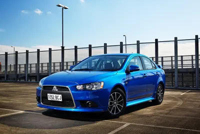 Blue Mitsubishi Lancer Cars Wallpaper 4K 2400x1600 Blue, Mitsubishi, Lancer, Sedan, Parked, On, A, Rooftop, Lot, Under, Clear, Sky, White, Landscape, Full HD