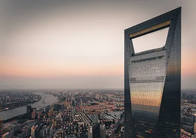 Towering Skyscraper Shanghai World Wallpaper 4K 2034x1436 A, Towering, Skyscraper, In, Shanghai, China, Stands, Prominently, Above, Cityscape, Sunset, Showcasing, White, Landscape, Full HD
